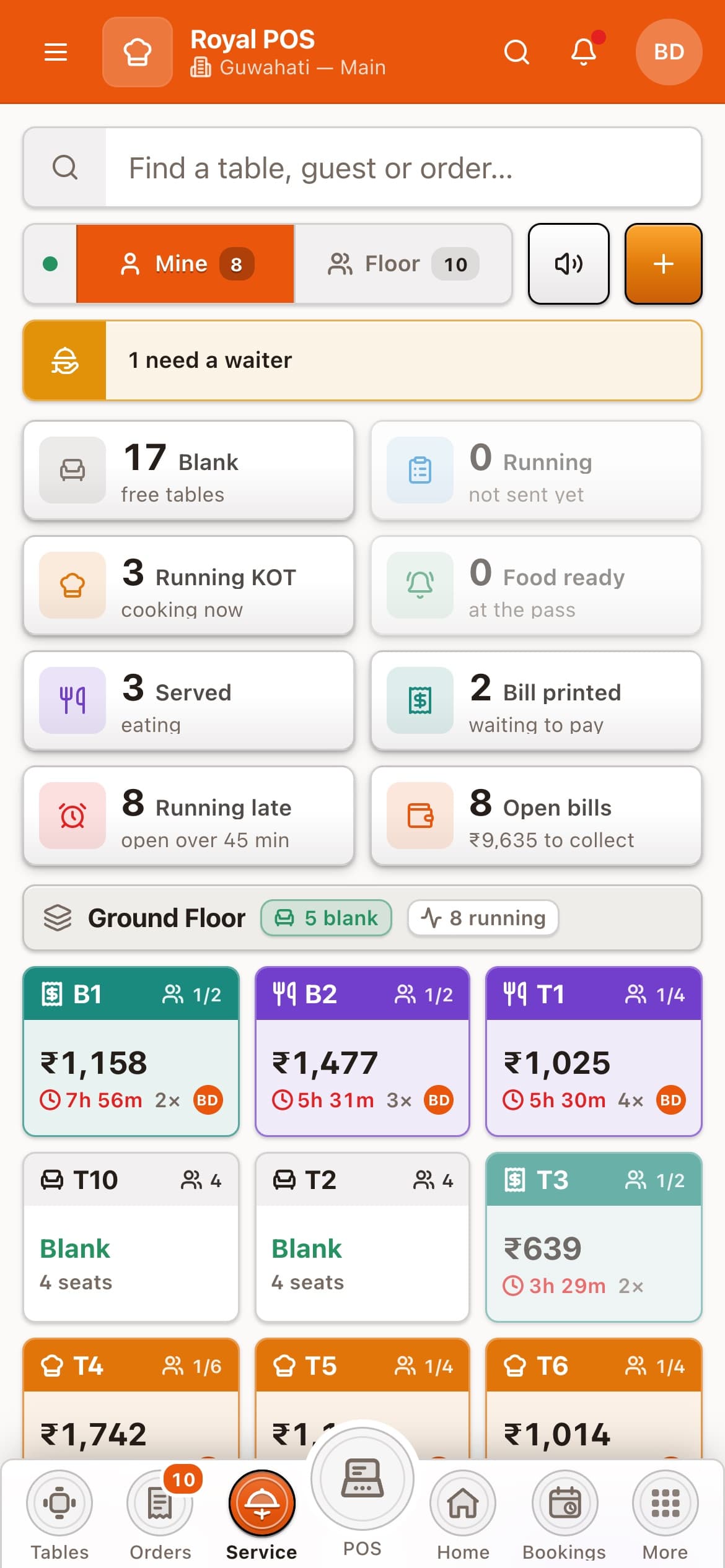 Table service on a waiter’s phone: table tiles showing running bills and time seated